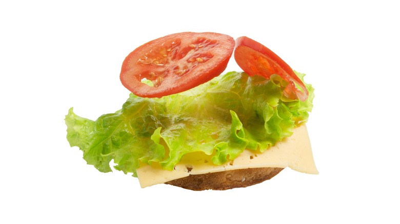 Deconstructed sandwich on white background