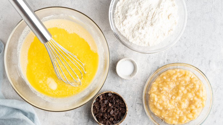 Banana bread ingredients separated into bowls