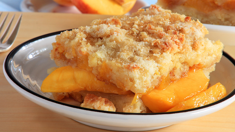 peach cobbler in bowl