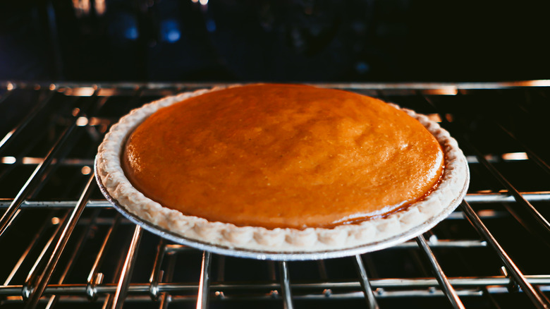 Pumpkin pie baking in the oven