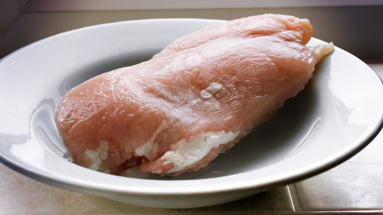 chicken breast thawing on counter