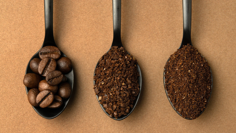 Spoons with powder and beans