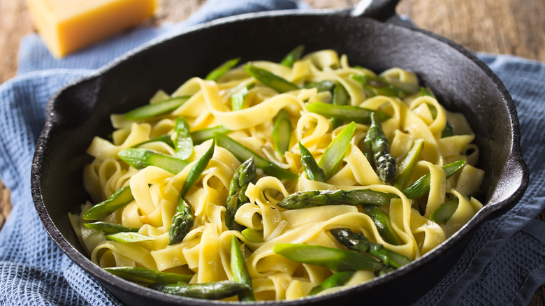 fettucine asparagus in cast iron pan