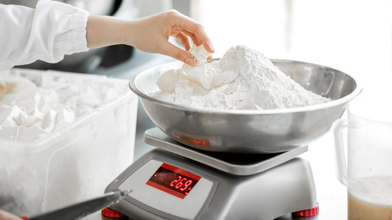 Measuring flour on digital scale