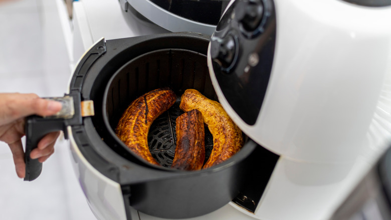 Opening air fryer with food