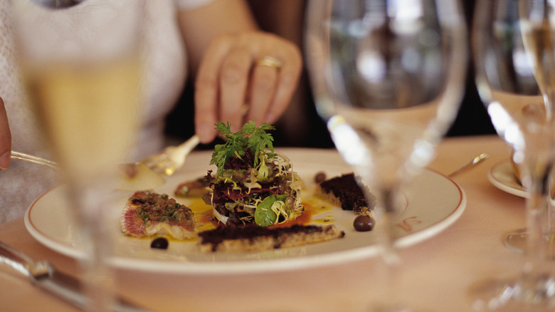 Diner eating meal French restaurant
