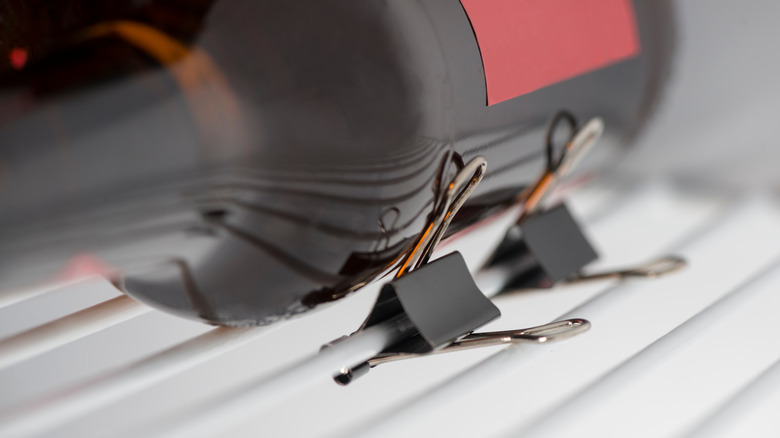 binder clip on fridge shelf