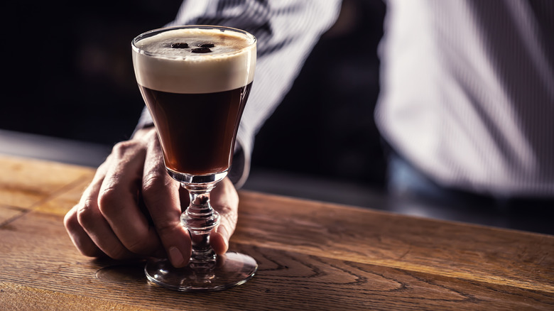 Bartender serving a Kentucky coffee