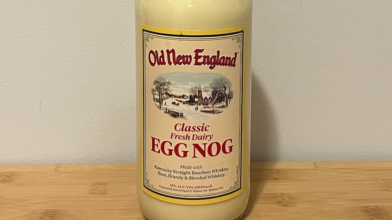 Old New England Classic Egg Nog bottle on table