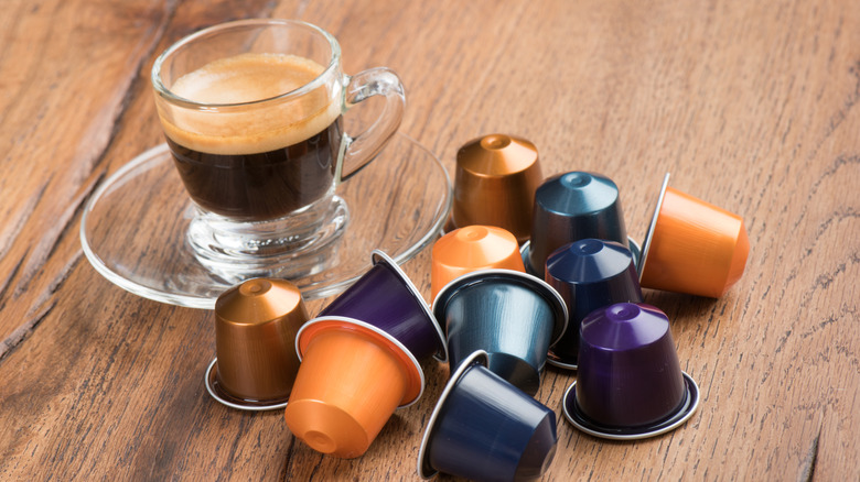 nespresso pods and cup of espresso