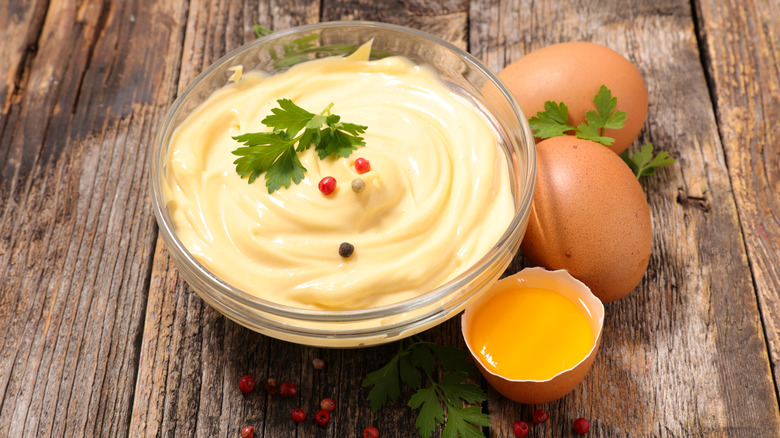 homemade mayonnaise on a wooden table