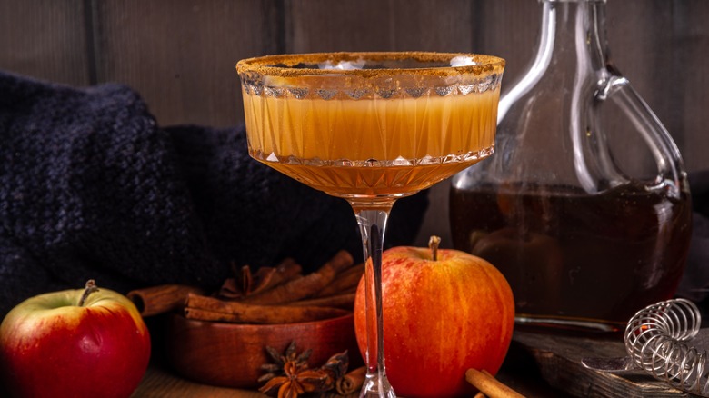 apple cider cocktail on wood table