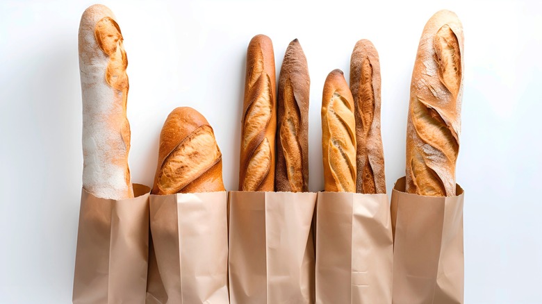 A French baguette variety on white background