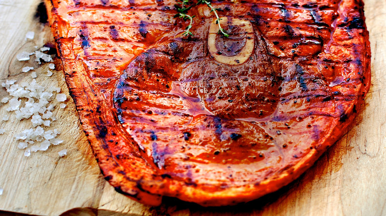 Glazed ham steak on wood