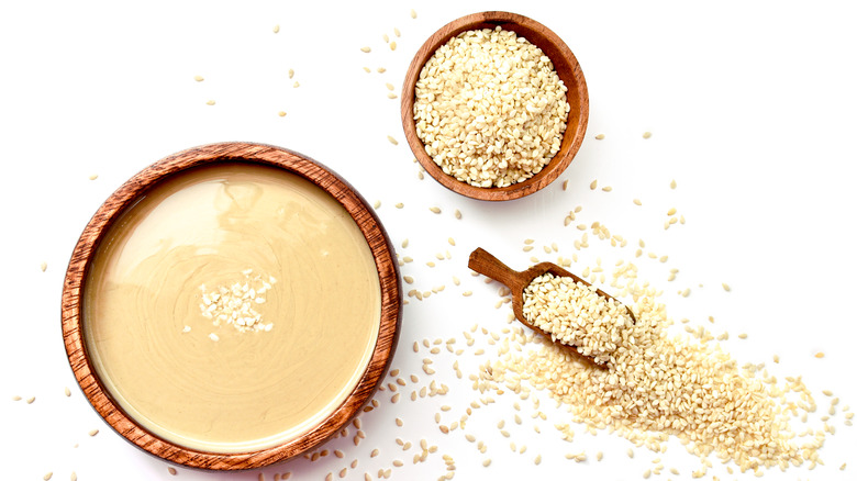 bowls of sesame seeds and tahini