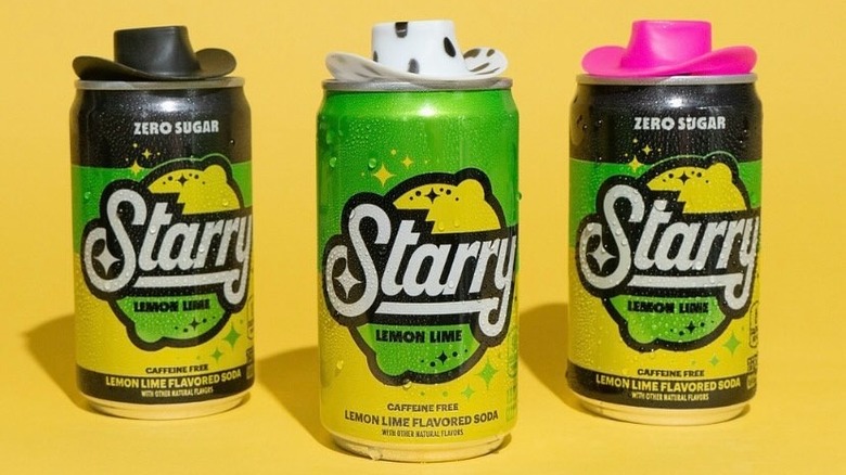 three cans of Starry soda