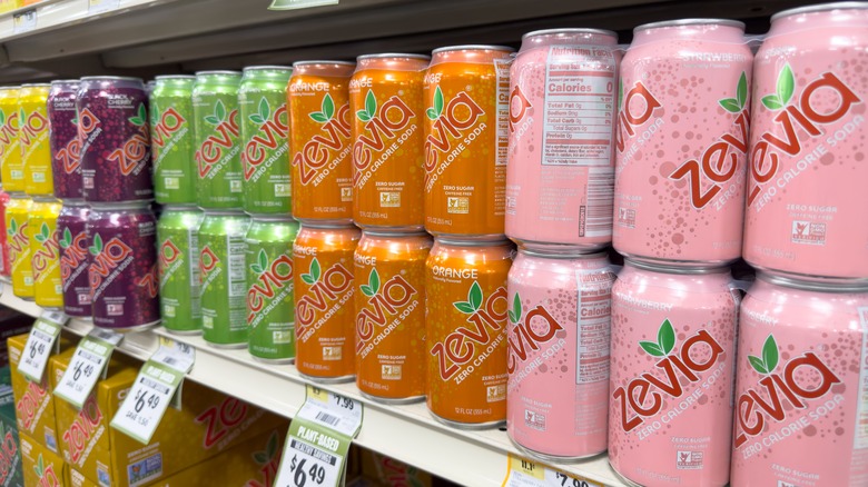 Colorful Zevia Cola cans on display