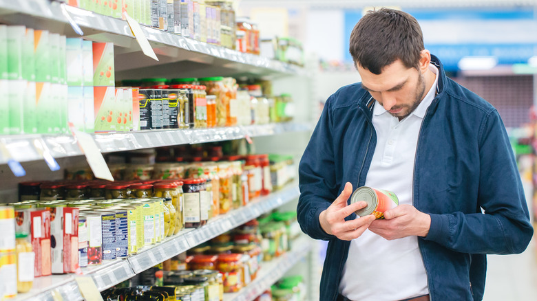 Man checking label 