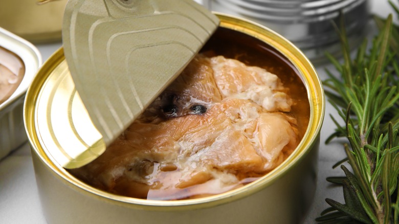 An opened can of salmon