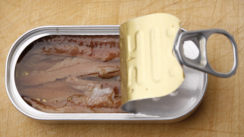 tinned anchovies on a table