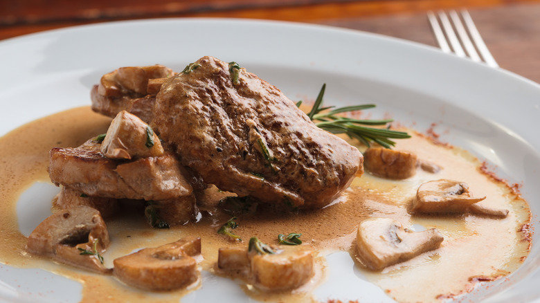 steak dinner with mushrooms and rosemary