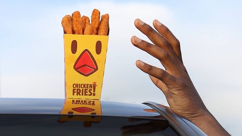 hand reaching for Burger King chicken fries