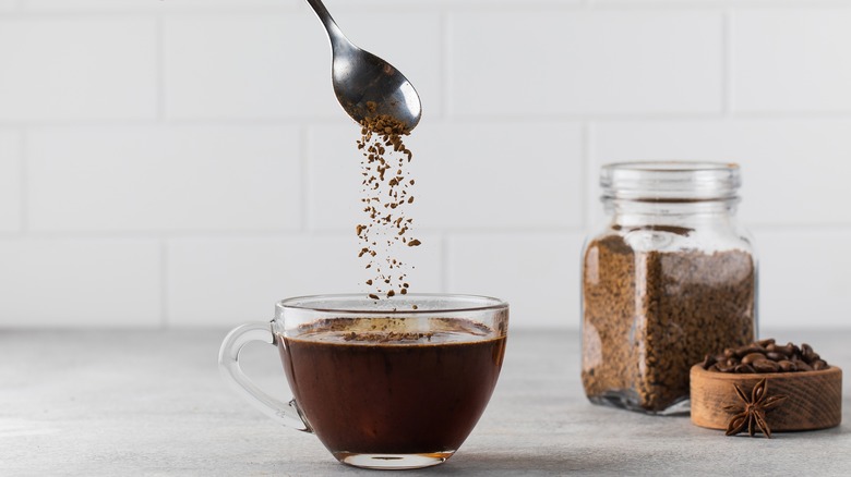 Instant coffee grounds with spoon