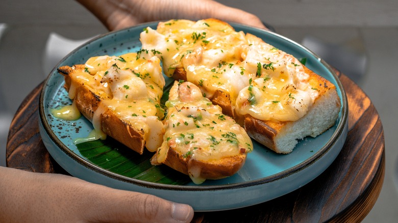 open face grilled cheese sandwich halves