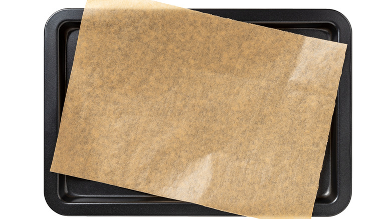 rimmed baking sheet with sheet of parchment paper on top