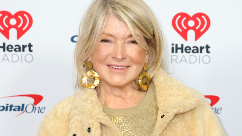 martha stewart smiling in yellow jacket