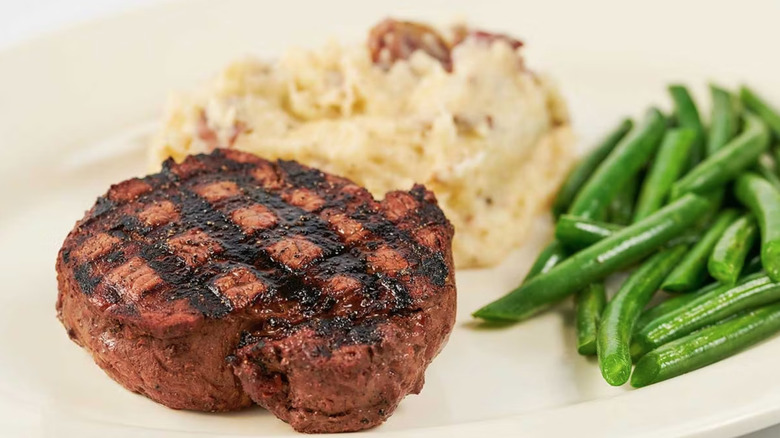 Steak, green beans, and mashed potatoes