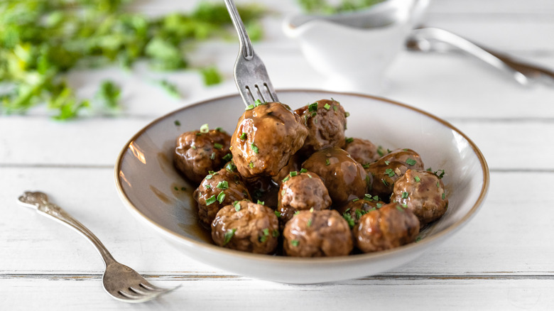 Meatballs on plate with sauce 