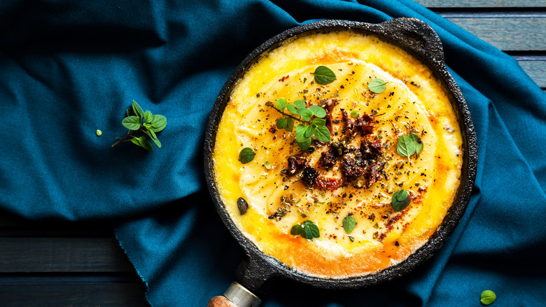 melted provolone cheese in a skillet 