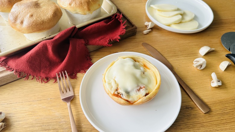 Pizza pot pie cut open on plate