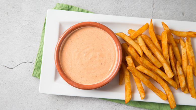 fries and dip on dish