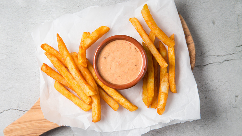 fries and dip on board