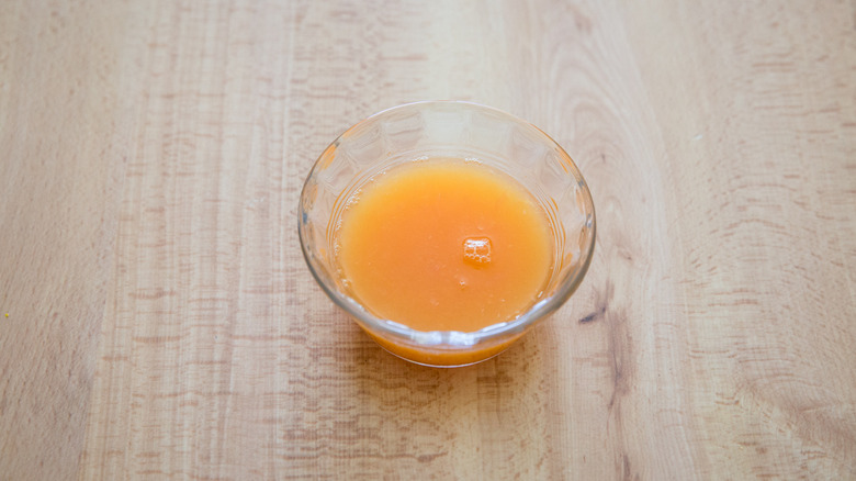 orange juice in small bowl