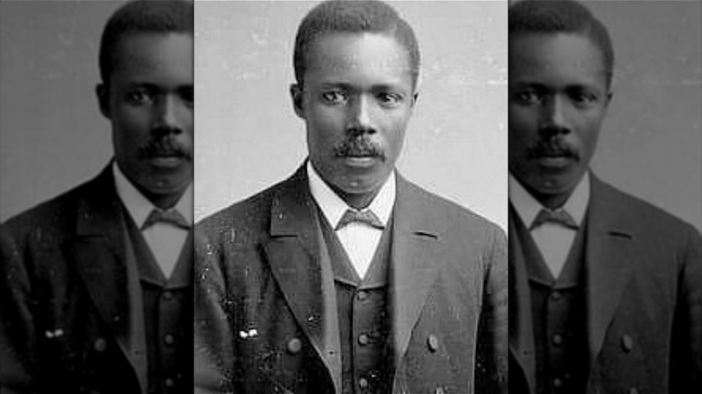 george crum in suit