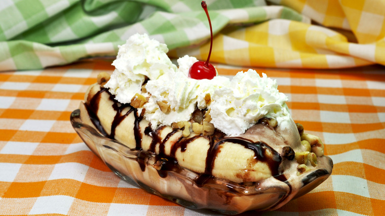 Banana split on checkered tablecloth