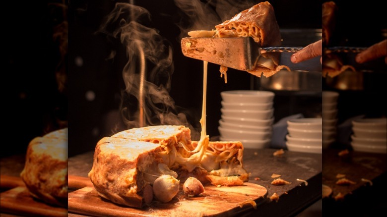 slice of Timpano on a cutting board