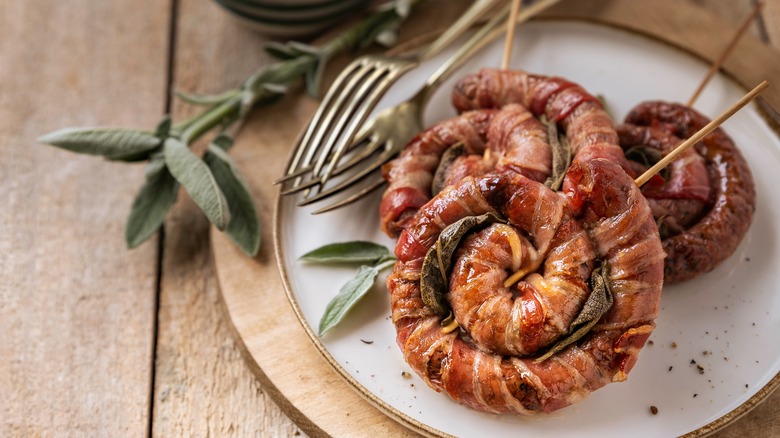 bacon wrapped sausages with sage