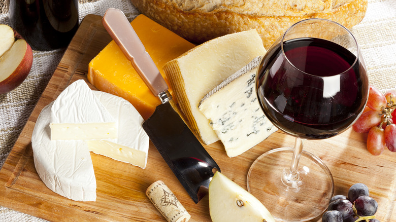 red wine and cheeses