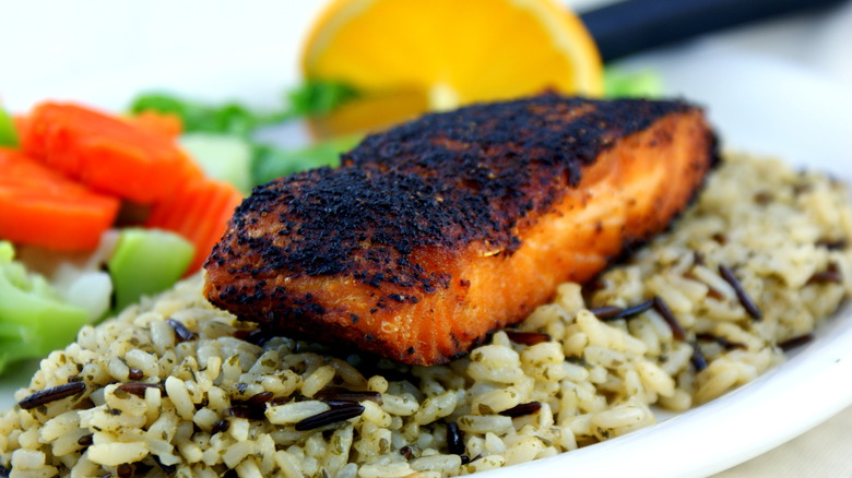 Blackened salmon over rice