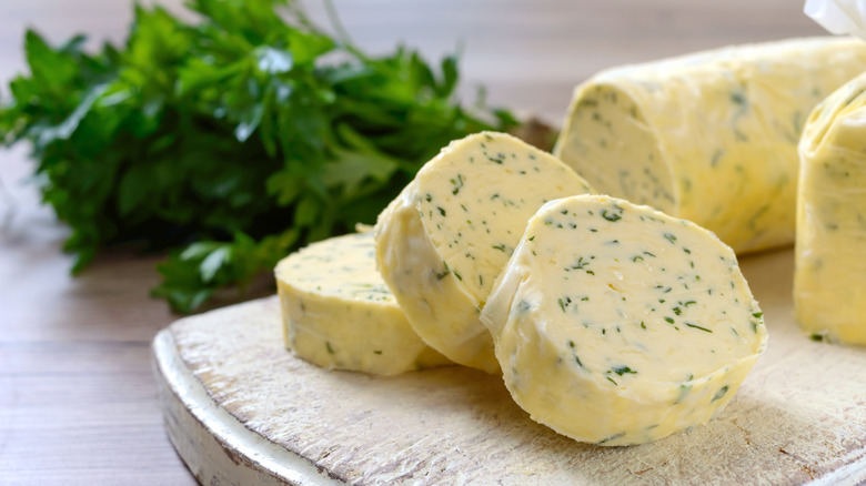 Herbs and butter on counter