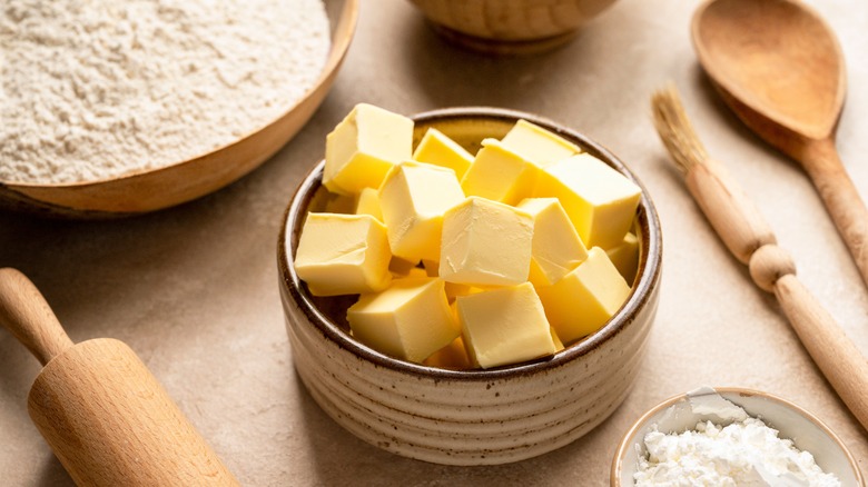 butter in bowl near baking station