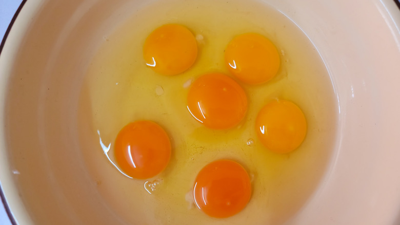 raw eggs in a bowl