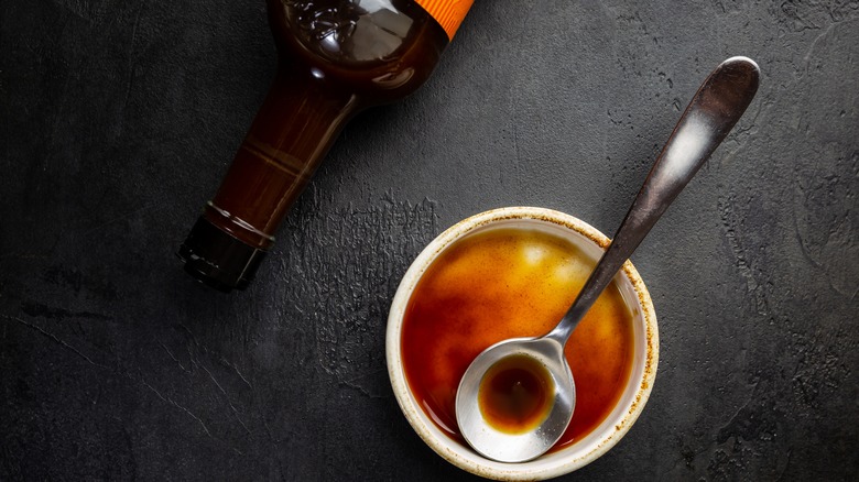 worcestershire sauce in bowl with spoon