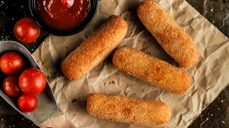 Mozzarella sticks and cherry tomatoes