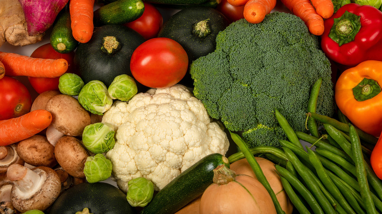 assorted vegetables laid out on a counter