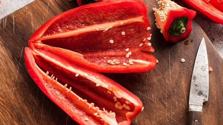 Red bell pepper on cutting board